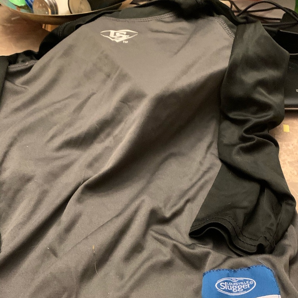 Youth small Louisville slugger tee shirt